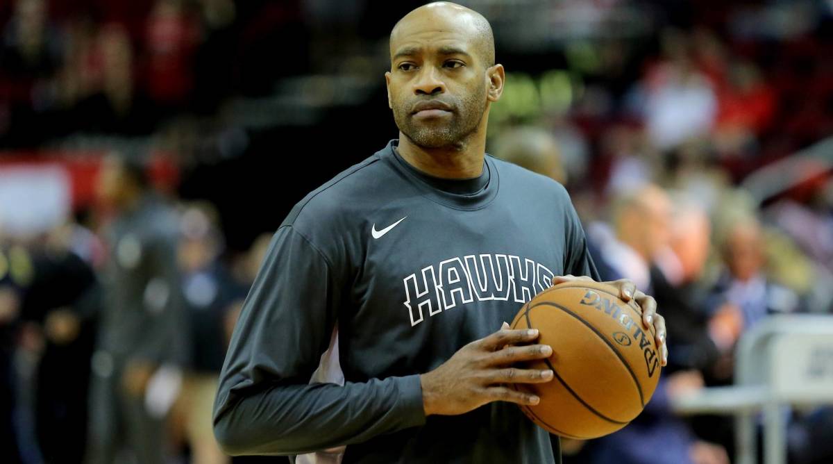Former guard Vince Carter looks on while warming up before an Atlanta Hawks game.